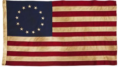 American Colonial Flag, popularly attributed to Betsy Ross, was designed during the American Revolutionary War features 13 stars to represent the original 13 colonies.