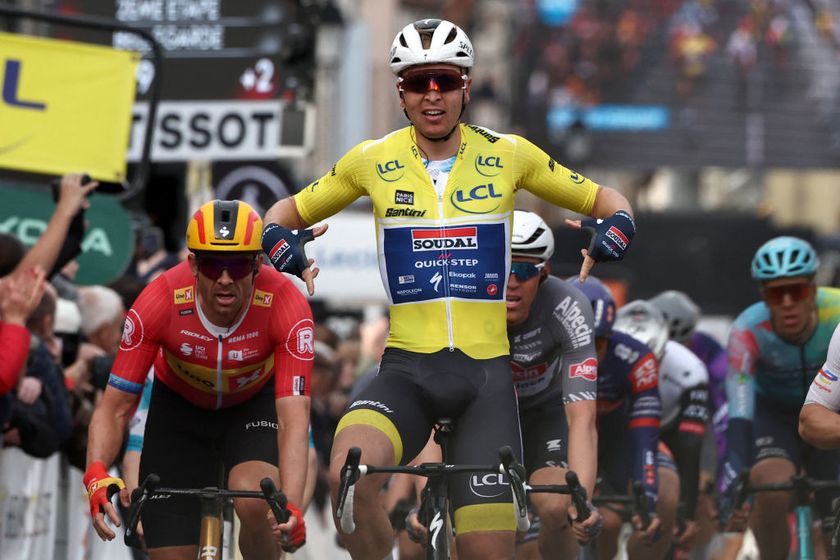 Paris-NIce 2025: Tim Merlier (Soudal-QuickStep) carries the overall leader&#039;s yellow jersey across the finish line for victory on stage 2 in Bellegarde