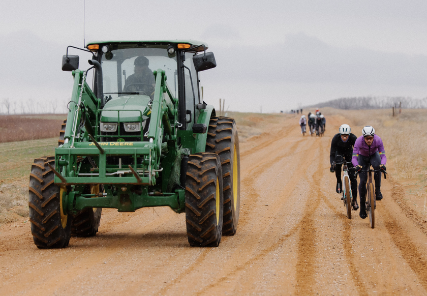 Riders share the road with the locals in Texas, with light snow on the red gravel at Valley of Tears