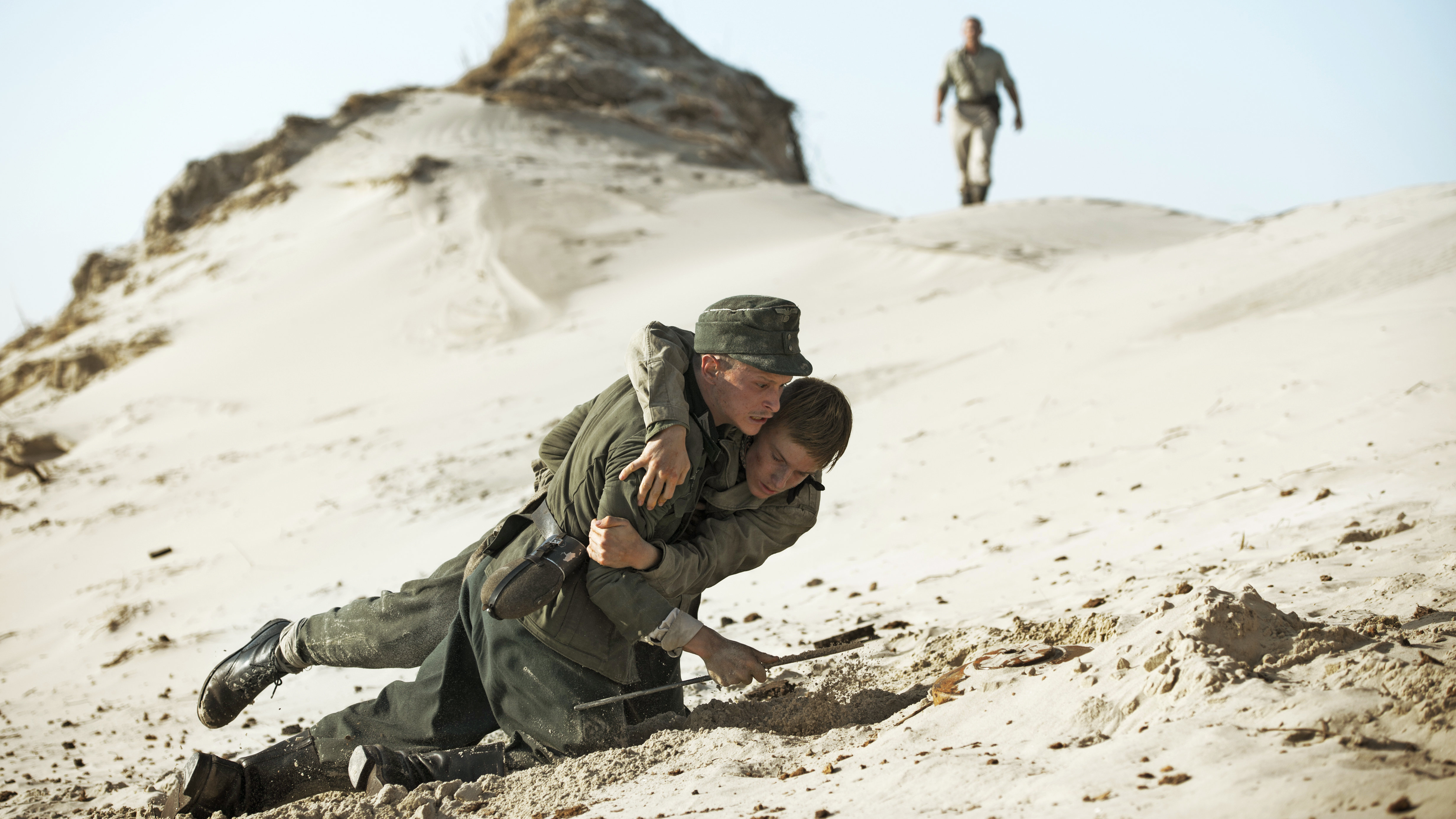 Joel Basman, Roland Møller, and Louis Hofmann in Land of Mine (2015)