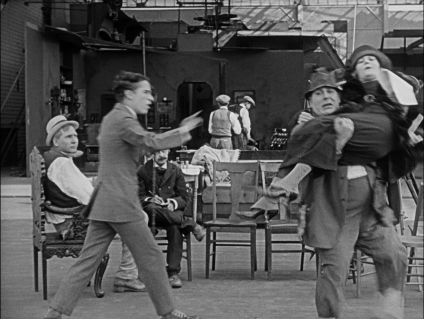 Charles Chaplin, Henry Bergman, Edna Purviance, and Loyal Underwood in The Chaplin Revue (1959)