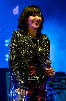 Karen O performing with Yeah Yeah Yeahs in 2018