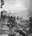 Confederate railroad being destroyed by U.S. forces during the Atlanta Campaign.