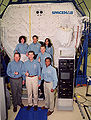 Crew in front of Spacehab module