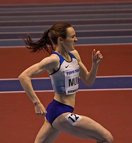 Laura Muir in actie op de 3000 m tijdens de WK indoor in 2018, Birmingham.