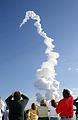 Columbia is visible at the top end of a column of smoke